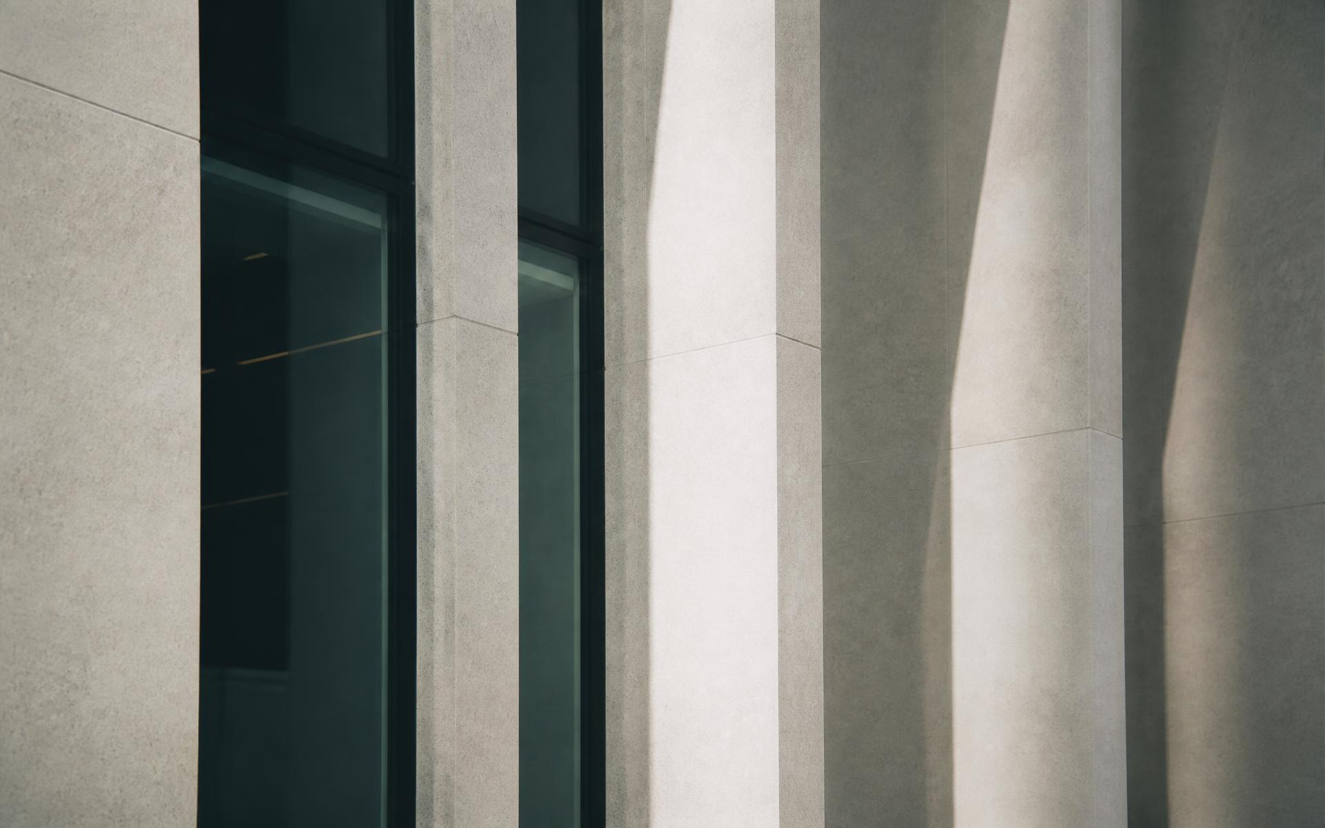 Minimalist stone and glass architectural facade